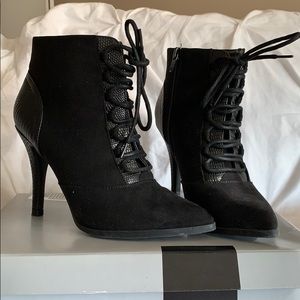 Black pointed toe tie up booties with side zipper